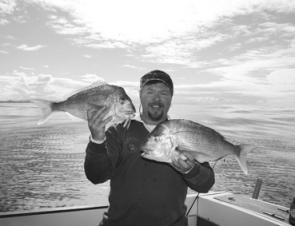 Good quality reds like these two caught by the author have made most inshore fishos smile over the cooler months.